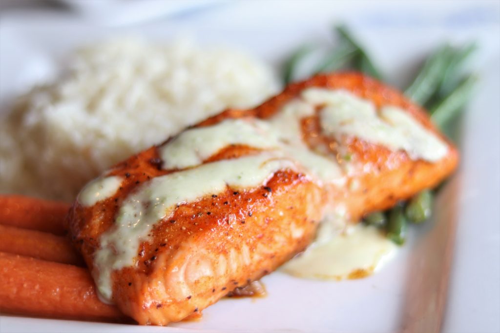 Salmon Coconut ginger rice, seasonal vegetables, jalapeño aioli.